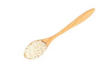Wooden spoon with white sesame isolated on white background.
