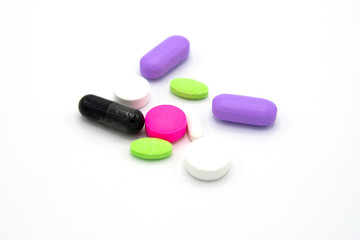 Obraz na płótnie Canvas Selective focus of antibiotic capsules pills on blur background with copy space. Drug resistance concept. Antibiotics drug use with reasonable and global healthcare concept.
