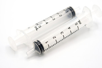 Syringe and isolated on a white background.