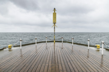 Tip of Sopot pier on a cloudy day