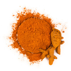 Turmeric powder and roots isolated on a white background. Top view.