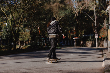 Kick pushing skateboard