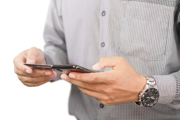  man holding a credit card and using phone payments to make online purchases with a credit card in a phone application and buying products online, I intend to selective focus ro soft focus