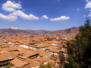 Roofs of Cusco, Peru. Cusco homes look uniform and symmetrical with their old orange or brick roofs.