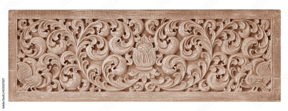 Wall mural Pattern of flower carved on wood background