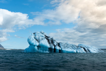 Icebergs Crashing Into Shore of Black Sand Beach - Diamond Beach, Iceland