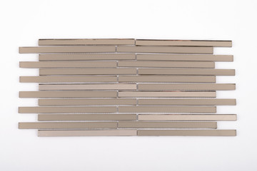 Glass and mirror mosaic without reflections isolated on a white background. For construction and repair in the bathroom, pool, kitchen.