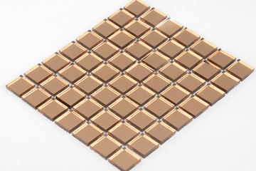 Glass and mirror mosaic without reflections isolated on a white background. For construction and repair in the bathroom, pool, kitchen.