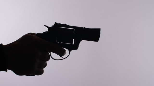 Man shoots from the gun
