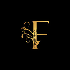 Golden floral letter F logo Icon, Luxury alphabet font initial vector design isolated on black background.