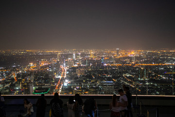  panoramic skyline of Bangkok by night from King Power Mahanakhon, Bangkok, Thailand