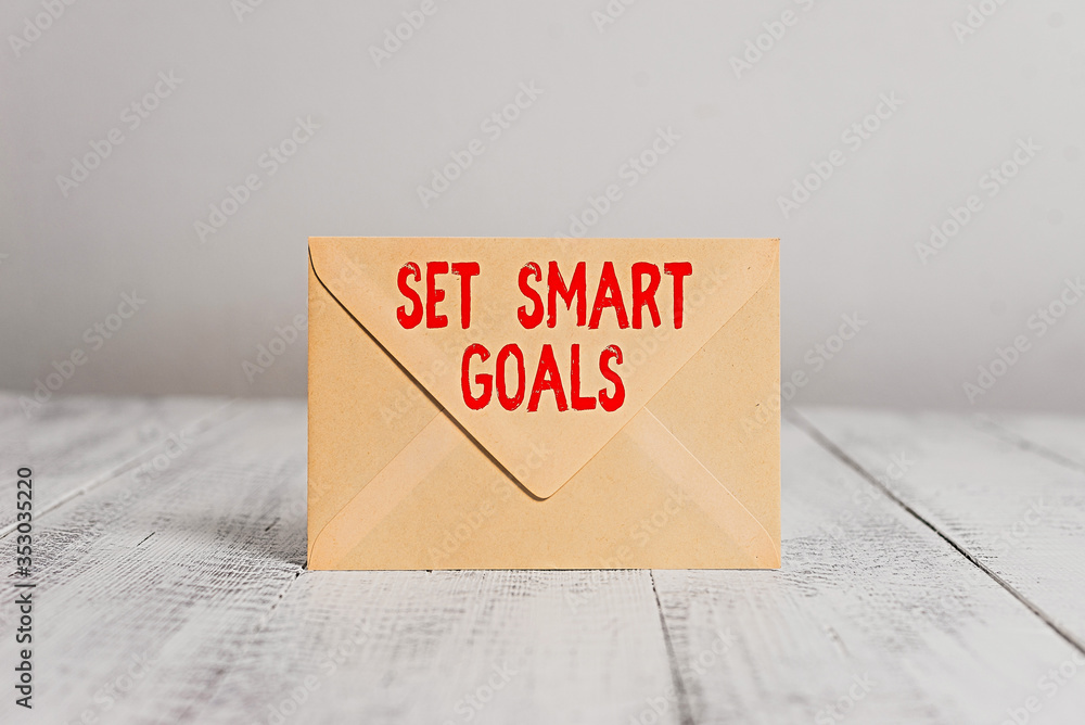 Aufkleber handwriting text writing set smart goals. conceptual photo giving criteria to guide in the setting o