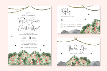 wedding invitation set with floral shrub garden background