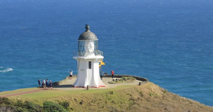 4K right to left panning motion of the lighthouse at the tip of Cape Reinga being the furthest northern point on the North Island of New Zealand,the lighthouse and cape is a famous tourist attraction 
