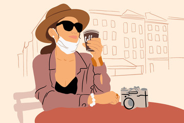 Woman in facial protective mask at the cafe outdoors