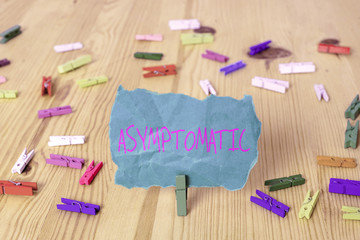 Word writing text Asymptomatic. Business photo showcasing a condition or an individual producing or...