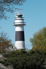 Leuchtturm in grau-wei&szlig;en Farben