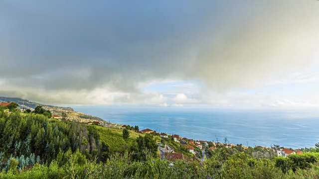 Time lapse movie of sunset over the city of Calheta on Madeira island