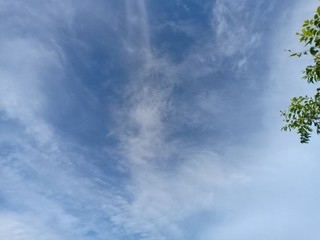 black and white clouds with blue sky