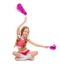 cute girl in a cheerleader costume sits on the floor