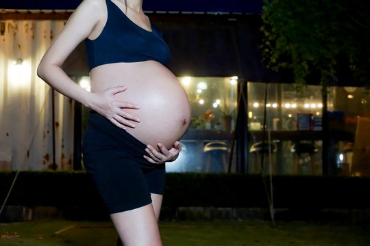 Asian lovely pregnent woman in night