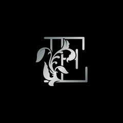 Rustic silver nature floral letter E initial logo icon luxury style vector design template for brand identity.