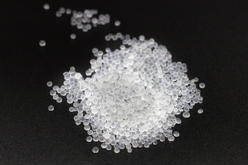 Desiccant silica gel absorbs moisture from the air, preventing damage - obrazy, fototapety, plakaty