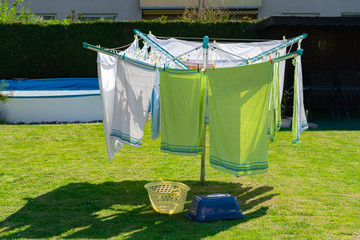 A fully hung clothes dryer in the garden