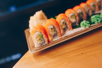 Large set of Sushi Rolls Warm Ebi Sake Unagi Spring. A lot assortment Philadelphia roll Dishes from Japanese raw fish  in one plate in traditional restaurant. Japan food menu service