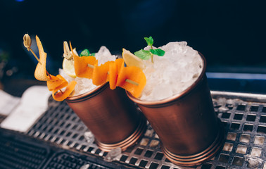 Sweet Famous white with caramels decoration slice  Author inspired Cocktail Drink - on bar counter . Close-up Top view . Copy paste space for design people and luxury service barman in nightclub