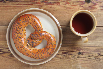 Poppy pretzel and tea cup