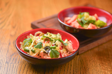 Vegetable salad with tomatoes, pepper, cucumbers, cabbage and mushrooms. Fresh organic veggies. Vegan, vegetarian diet.