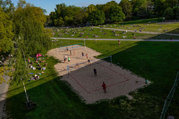 Stockholm, Sweden  People in the Ralambshovspark on a summer day during the Coronavirus pandemic.