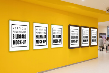 Mock up blank poster in six frames on yellow wall