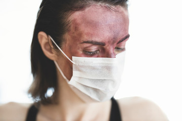 face painted girl and coronavirus mask