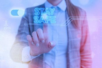 Word writing text Stay Safe. Business photo showcasing secure from threat of danger, harm or place...