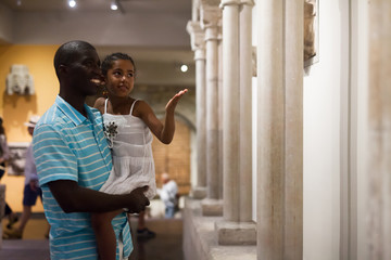 Man and his daughter at hall of Museum