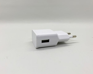 White plug charger isolated on white background