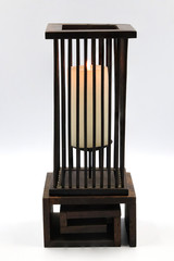 White candle . steel mix wooden candle holder . Old steel with wooden candle holder on white background 