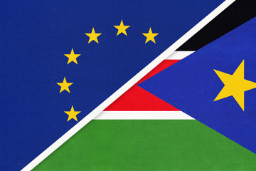 European Union or EU and South Sudan national flag from textile. Symbol of the Council of Europe association.