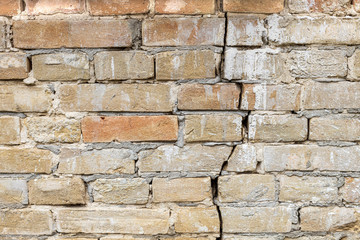 Brick wall with a crack background.