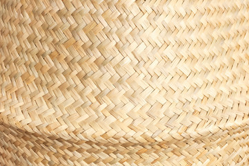 Texture of straw weaving closeup. Straw wicker basket. Fashionable bamboo basket, stylish interior item, eco design, handmade. Natural decor. Straw weave texture. Natural eco materials, storage basket