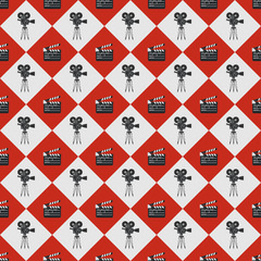 Cinema seamless pattern. Wallpaper with movie camera and clapboard.