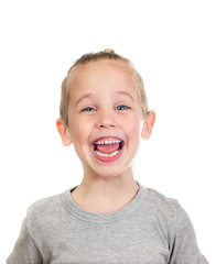 Young laughing caucasian boy isolated on white background