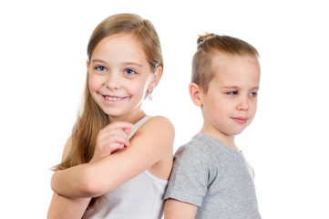 Young smiling caucasian girl and boy isolated on white background - 353064221