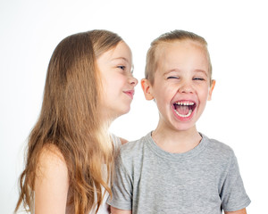 Young smiling caucasian girl and laughing boy fooling around isolated on white background - 353064294