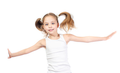 Young cute smiling girl with grey blue eyes and two hair tails jumps isolated on white background - 353064403