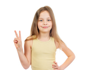 Young cute smiling  girl with long light brown hair shows victory sign isolated on white background - 353064694