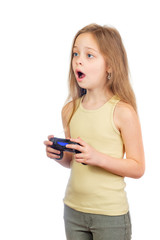 Young bored cute girl with grey blue eyes and long light brown hair plays computer game with joystick isolated on white background - 353064861