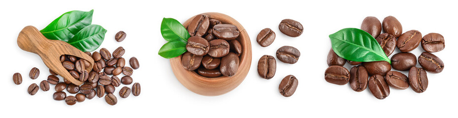 Heap of roasted coffee beans with leaves isolated on white background . Set or collection